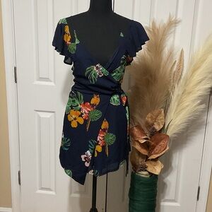 Fashion Nova Navy Floral Wrap Romper